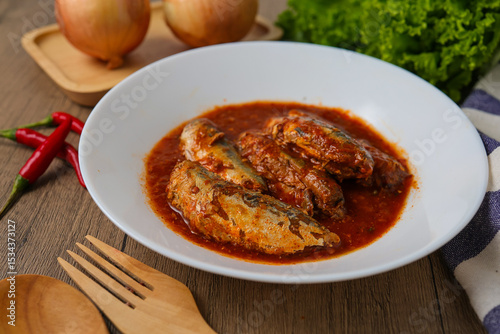 Mackerel in Tomato Sauce with chilli,canned fish,Tinned fish in a white plate	
