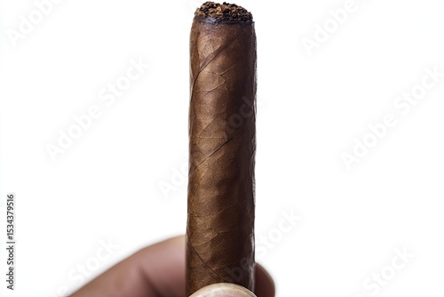 Close-up of a cigar held in a hand
