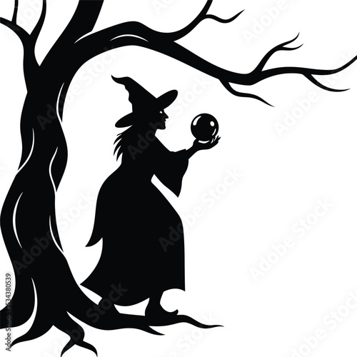Mystical Silhouette of a Witch Gazing into a Crystal Ball Under a Bare Tree