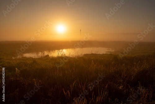 Autumn nature. Landscape with sunrise over the river on an autumn morning.
