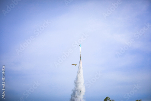 Fototapeta Naklejka Na Ścianę i Meble -  Yasothon, Thailand -18 May 2025 : Yasothon Rocket Festival Lighting rockets is a ritual asking for rain to the gods to get water for agriculture. according to local beliefs joyful atmosphere,to local