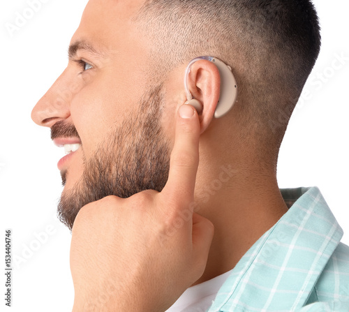 Young man with hearing aid ...