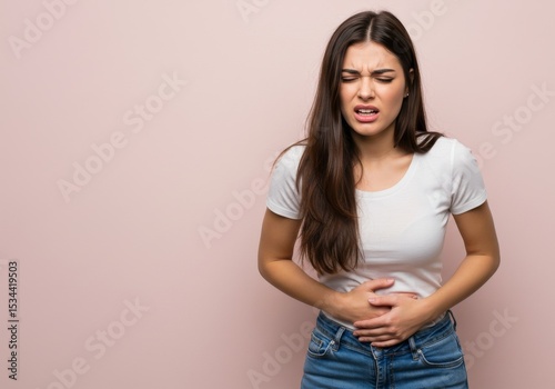 Young Woman Experiencing Stomach Pain A Visual Representation of Abdominal Discomfort