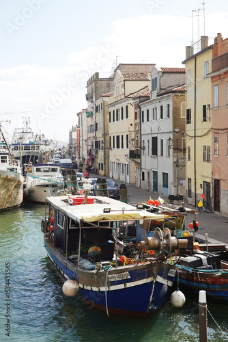 Fototapeta Naklejka Na Ścianę i Meble -  Old canals and streets in Chioggia, Italy