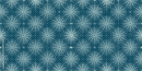 Geometric pattern featuring intricate circular designs in teal and white.