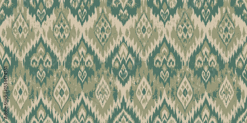 Stylish green and beige ikat pattern for vibrant textile design.