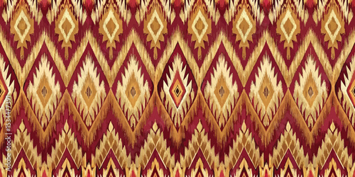 Rich textured fabric pattern with golden and red geometric designs.