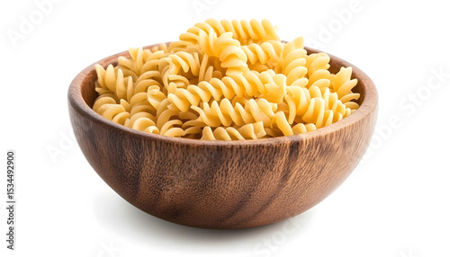 Bowl of raw fusilli pasta isolated on white background