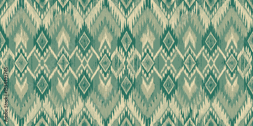 Intricate green and beige geometric pattern with a vintage touch.
