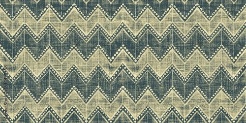 Geometric chevron pattern in navy and beige tones.
