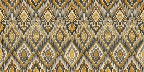 Intricate Indian textile pattern featuring vibrant yellow, gray, and white hues.