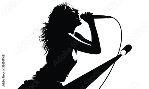 Silhouette of female singer performing on stage