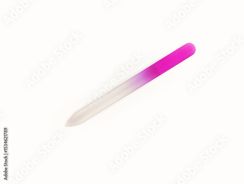 Glass nail file with pink handle resting on a white surface in bright lighting