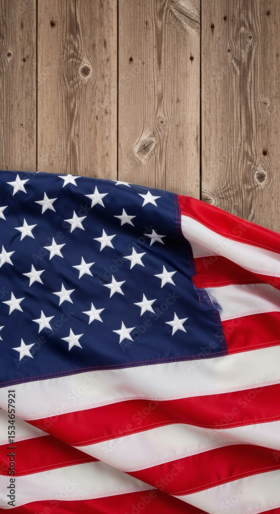 Obraz premium Close-Up of American Flag on Rustic Wooden Background for 4th of July Celebration and Patriotism