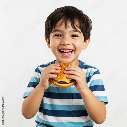 Boy preparing to eat a hamburger, happy and satisfied face on white