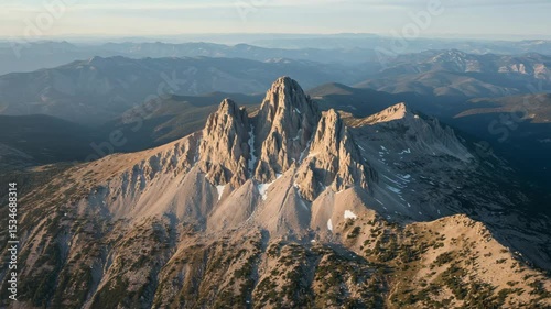 Majestic Mountain Peaks Surrounded by Scenic Landscape and Sky