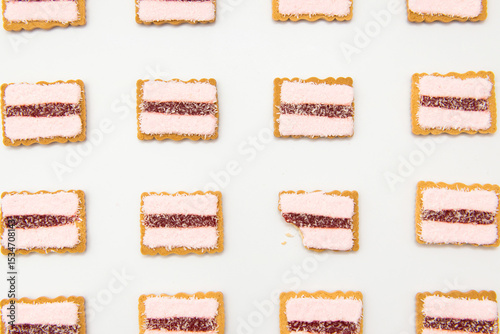 Rows of iced vovo biscuits