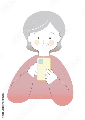 スマホを操作するシニア女性