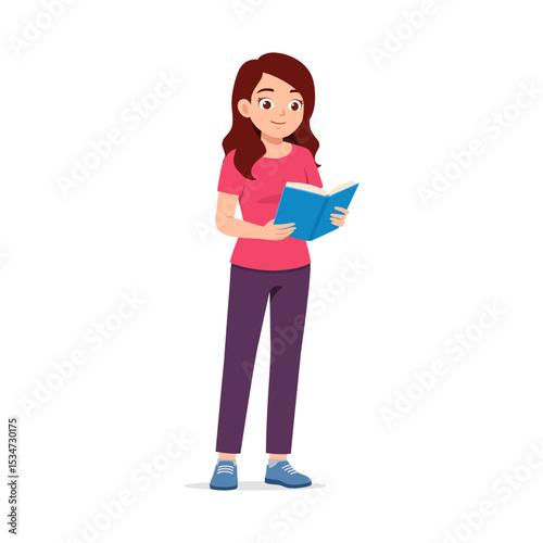 A brunette woman reading a blue book standing on a white background with a smile