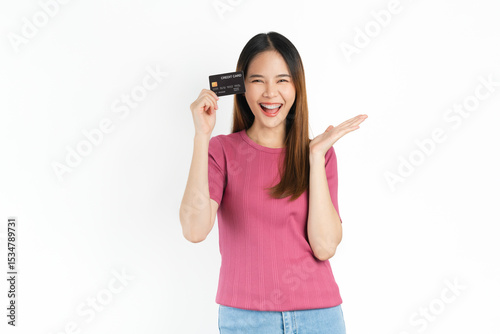 Smiling asian woman hand holding credit card on white background.