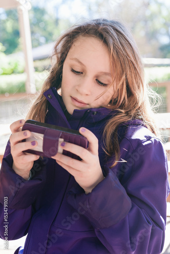 tween girl with mobile phone
