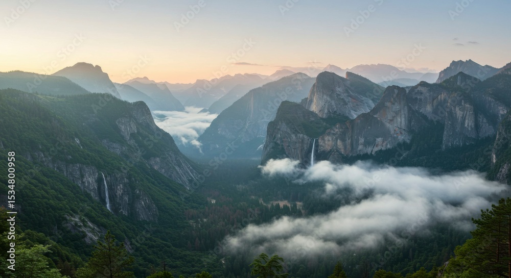 Fototapeta premium Misty mountain valley vista at dawn