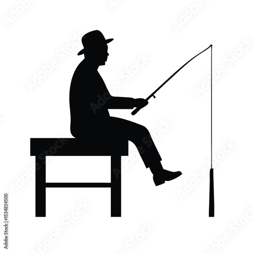 Silhouette of a fisherman sitting and fishing