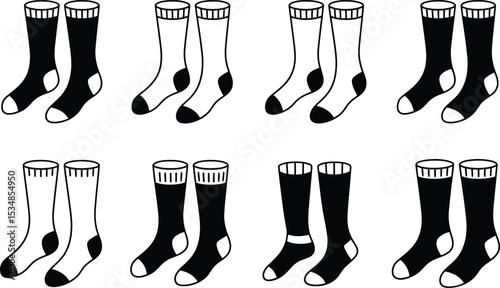 Monochrome illustration of multiple pairs of socks in varying colors and styles against white background