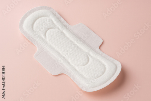 Feminine Sanitary Pad on Soft Pink Background for Hygiene Concept