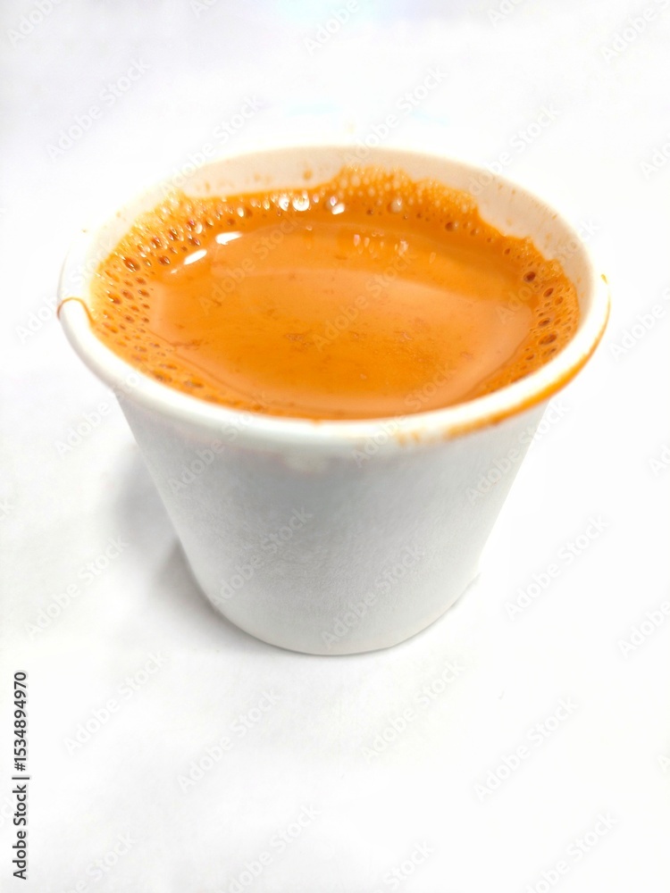 Indian hot tea in white paper cup Indian hot tea in white paper cup