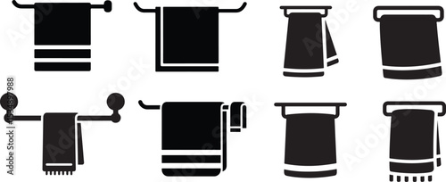 Four simple black and white illustrations of towels hanging from a rack.
