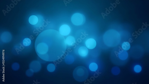 Abstract blue background with blurred light circles creating a dreamy atmosphere