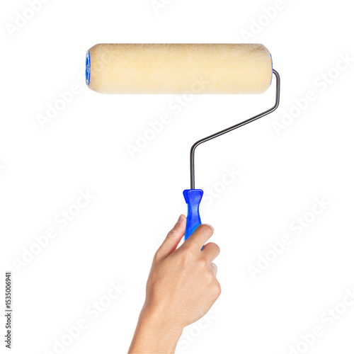 Hand holding blue paint roller on white background