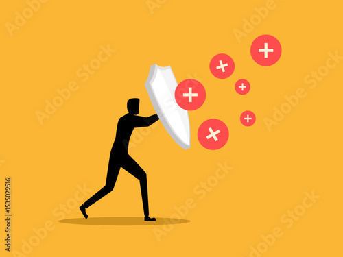 Businessman holding shield to increase defense level
