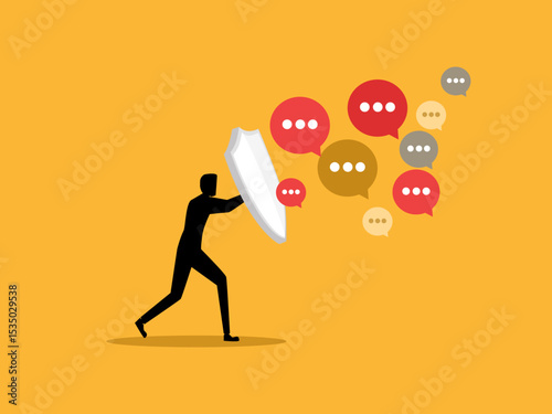 Businessman holding shield protecting speech bubble of criticism