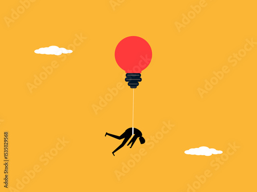Light bulb balloon helps businessman float in the sky