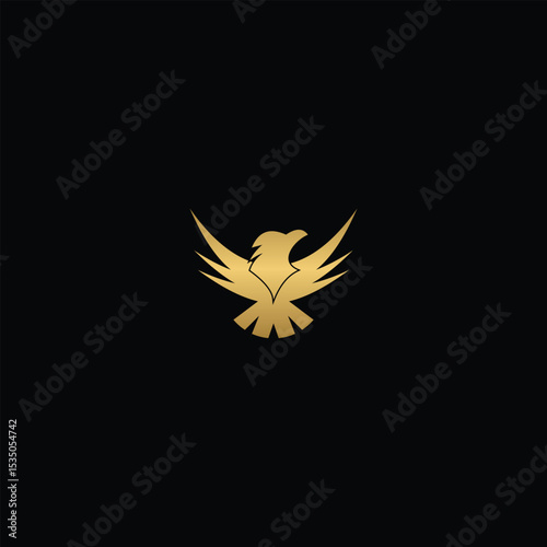 Golden eagle silhouette emblem on black background for exclusive design concept