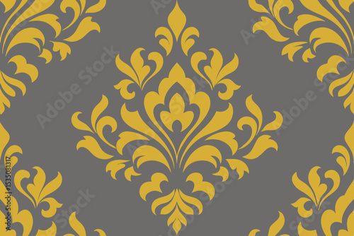 Seamless gold floral pattern on an antique damask textile, perfect for vintage wallpaper design