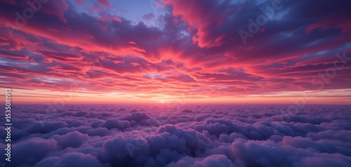 Stunning purple and pink sunset above a sea of fluffy clouds creating a vibrant sky