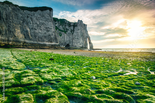 Magnificent mossy beach and spectacular sunset near Etretat, Normandy, France