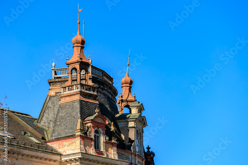 Victorian architecture with turrets under clear blue sky