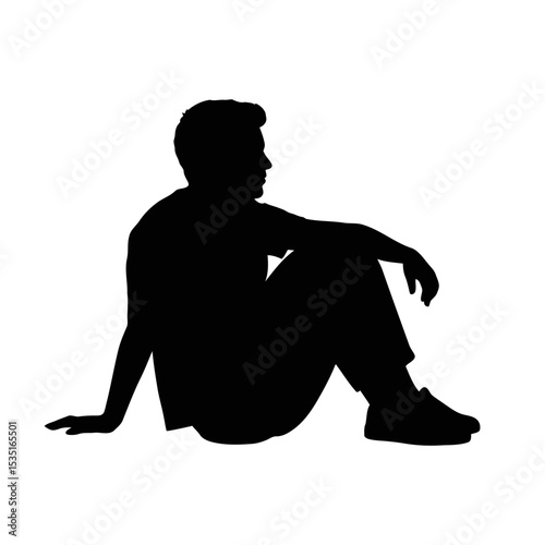 Man sitting with his legs crossed, silhouette of contemplation