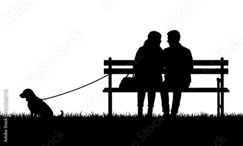 Silhouette of a couple sitting on a bench with a dog on a leash
