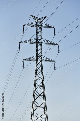 Hight voltage pole and blue sky, electric cebles in Wroclaw, Poland.