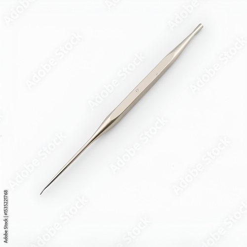 A sleek, stainless steel dental probe instrument with a curved tip and graduated markings lies on a clean, white background, ready for examination.