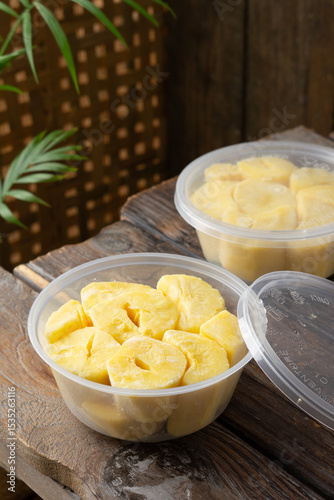 Traditional Malaysian fermented tapioca dessert known as tapai ubi kayu served on a white plate