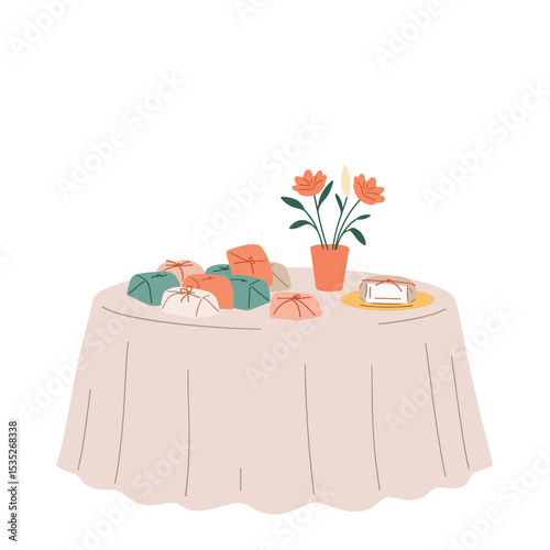 Wrapped favors at wedding table with flowers and decorations  