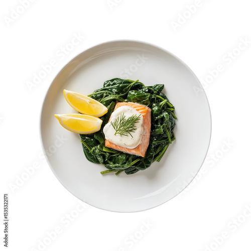 Elegant Salmon Fillet on Spinach with Lemon Wedges