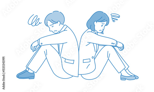  落ち込んで背中合わせに座るビジネス男女