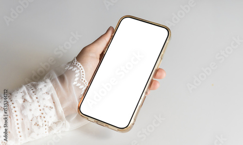 Woman holding mobile phone with white blank display, empty screen for social media, advertise, contact marketing, business and technology. Cell phone blank white screen mockup